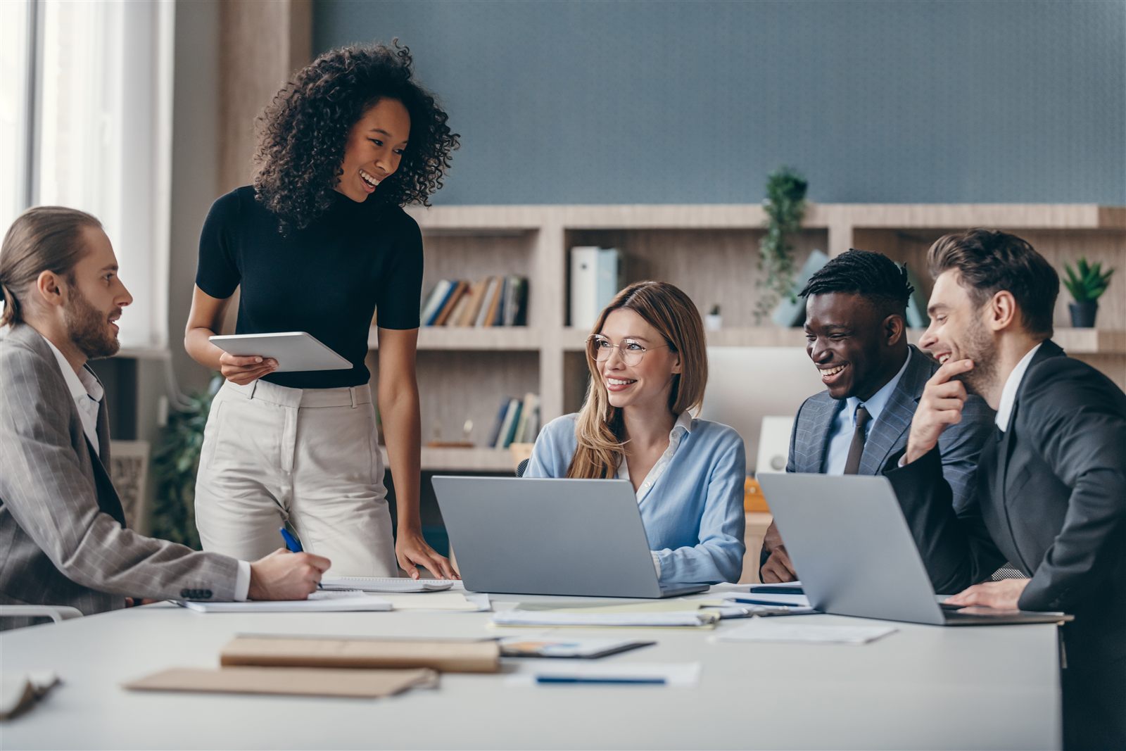 The Swarg AI Labs team collaborating on a project in a modern office